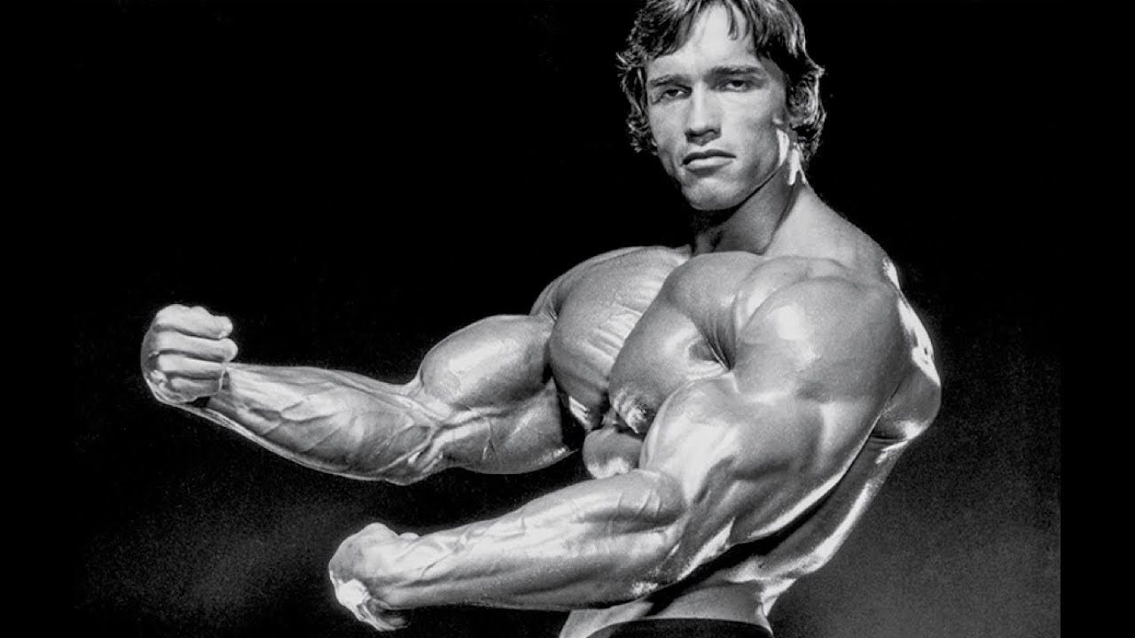 Studio Shot Of Young Male Bodybuilder Posing, Showing Side Biceps And Chest  Pose, On Black Background. Stock Photo, Picture and Royalty Free Image.  Image 105834798.